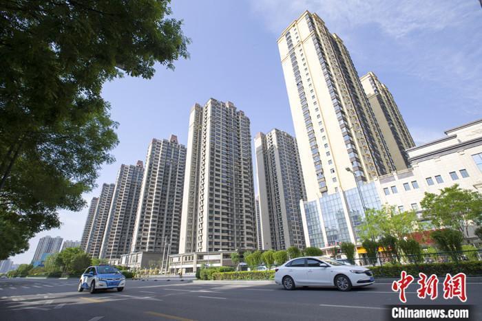 資料圖：車輛從一樓盤前經過。 <a target='_blank' href='/'><p  align=