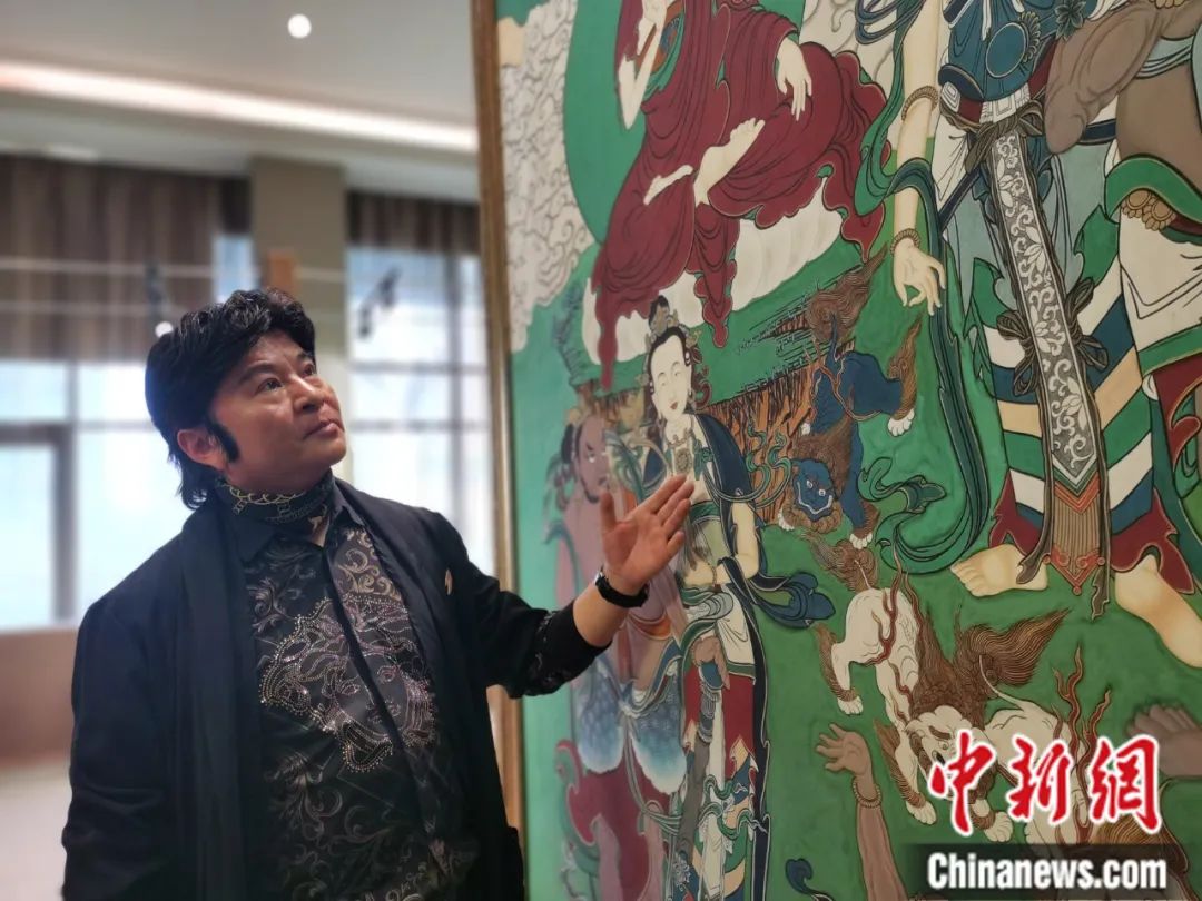 國家一級(jí)美術(shù)師劉觖。張?zhí)砀?攝